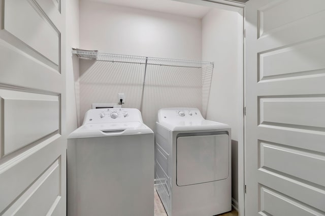 laundry room with washer and dryer