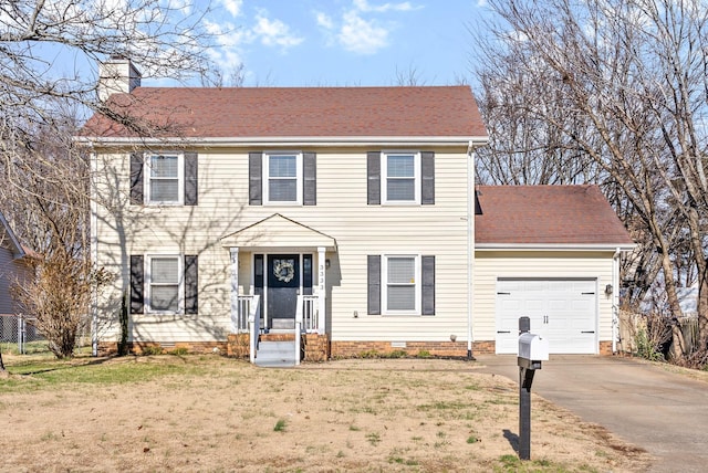 colonial house featuring a garage