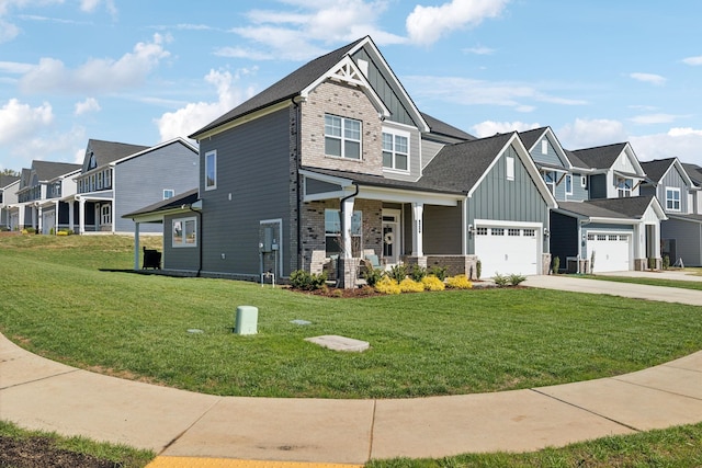 craftsman-style home featuring a porch, a garage, and a front yard