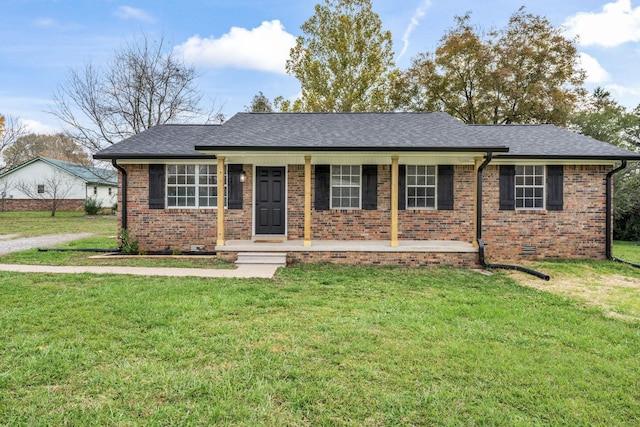 ranch-style house with covered porch and a front yard