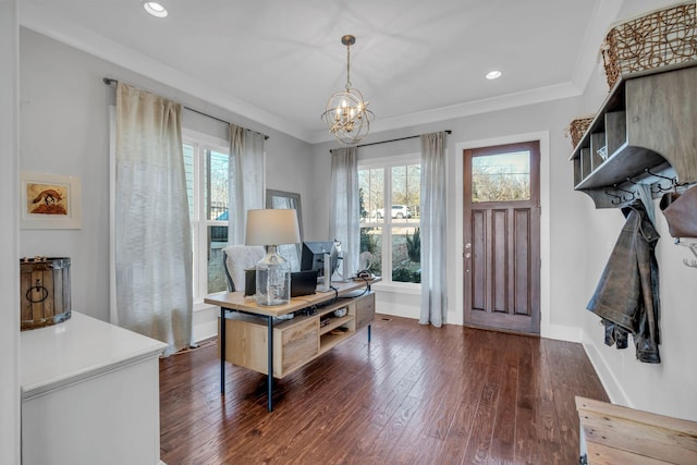 office area with a chandelier, a wealth of natural light, and crown molding