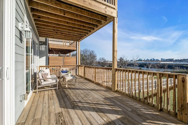 wooden deck with a water view