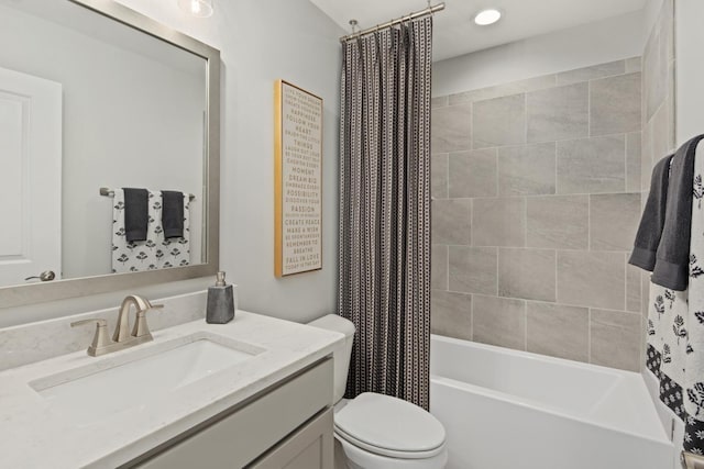 full bathroom with vanity, toilet, and shower / bathtub combination with curtain