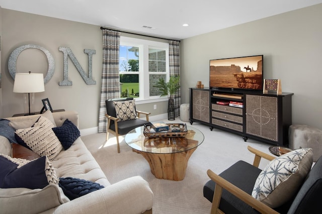 living room featuring light carpet