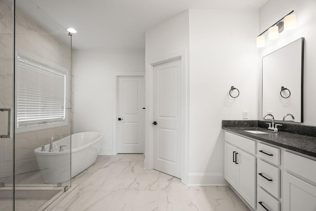 bathroom featuring a bathtub and vanity