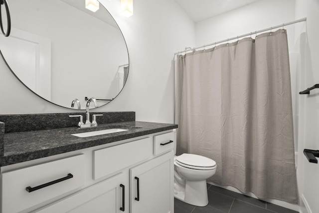 bathroom with tile patterned floors, vanity, toilet, and a shower with shower curtain