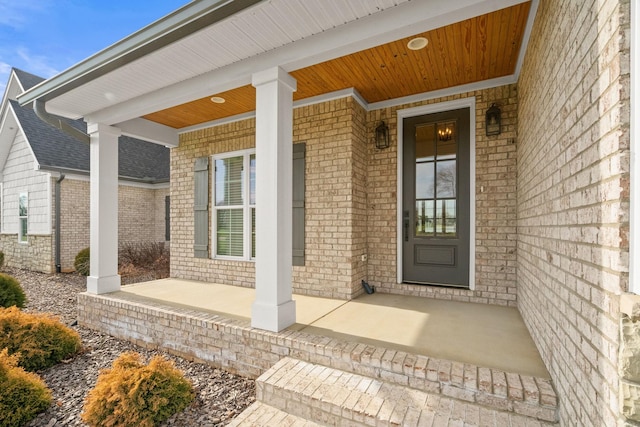 entrance to property featuring a porch