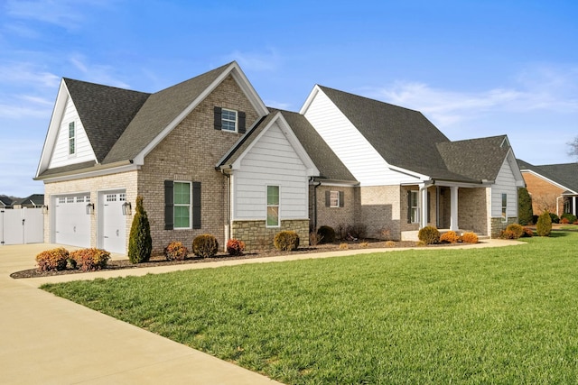 view of front facade with a garage and a front lawn