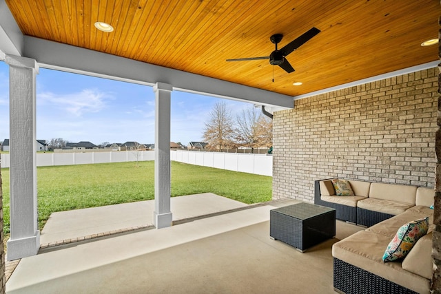 view of patio / terrace featuring ceiling fan