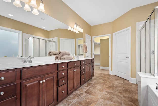 bathroom with vanity and walk in shower