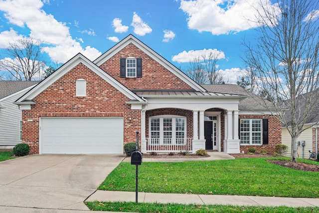 view of front of home featuring a garage and a front yard