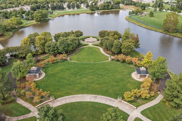 birds eye view of property with a water view