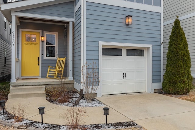 entrance to property featuring a garage