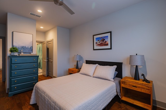 bedroom featuring dark hardwood / wood-style flooring and ceiling fan