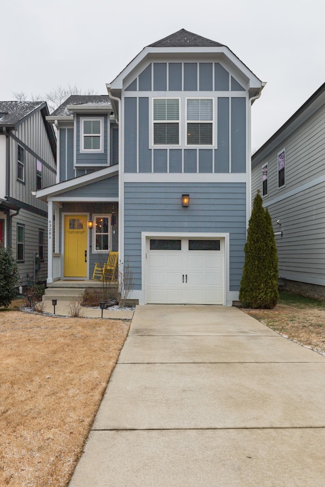 view of front of property featuring a porch and a garage