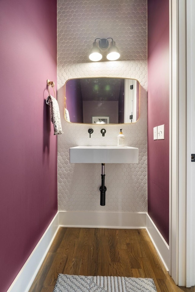 bathroom with wood-type flooring