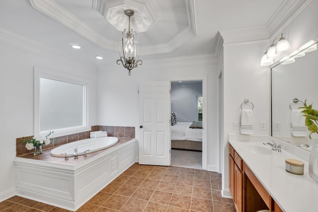 bathroom featuring tile patterned flooring, a tub to relax in, a tray ceiling, and ornamental molding