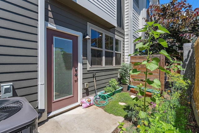 property entrance featuring a patio area