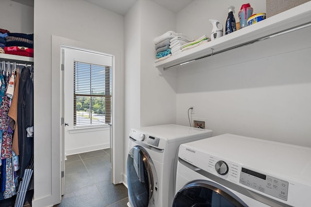 washroom with washer and clothes dryer