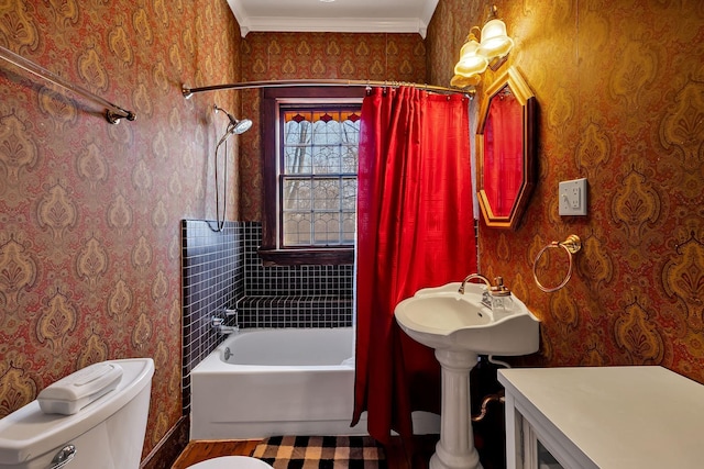 bathroom featuring shower / bath combo, toilet, and crown molding