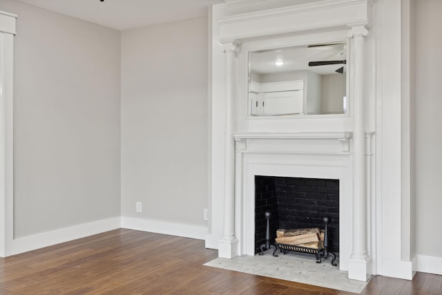 unfurnished living room featuring hardwood / wood-style floors