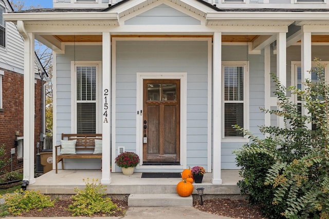 entrance to property with covered porch