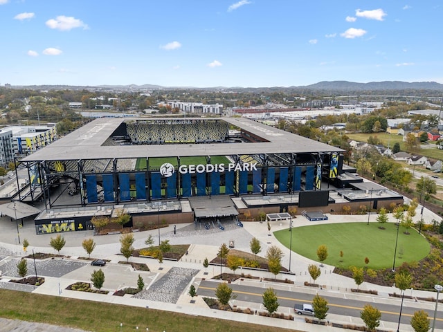 birds eye view of property featuring a mountain view