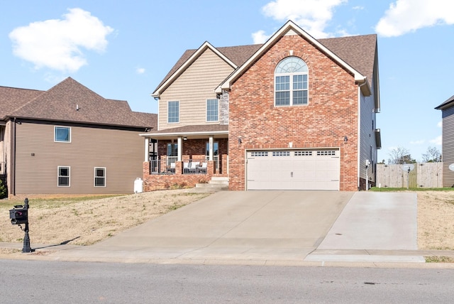 front facade featuring covered porch and a garage