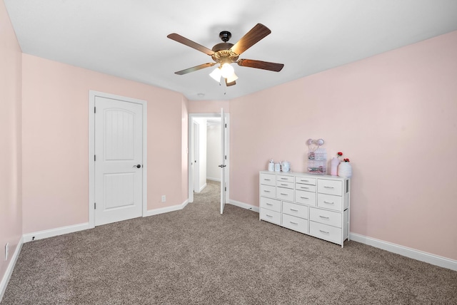 unfurnished bedroom with carpet flooring and ceiling fan