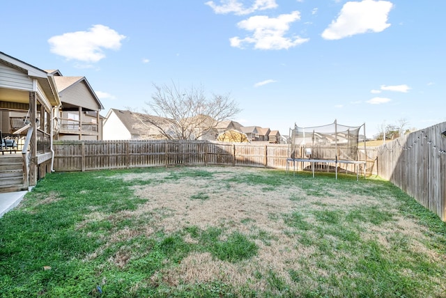 view of yard featuring a trampoline