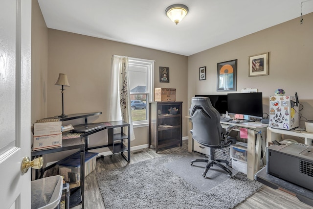 office space with hardwood / wood-style floors