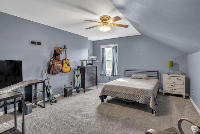 bedroom featuring carpet floors, vaulted ceiling, and ceiling fan