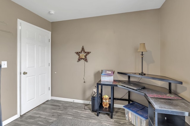 office area with hardwood / wood-style flooring