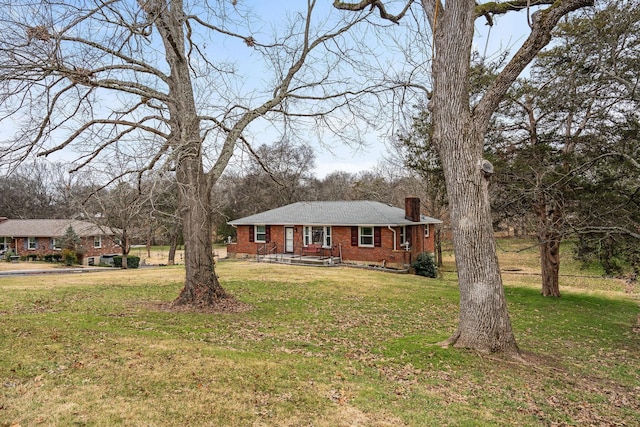 view of front of property with a front yard