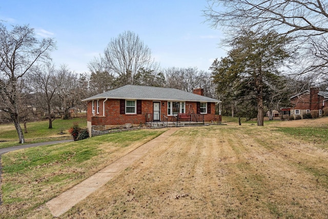 ranch-style house with a front lawn