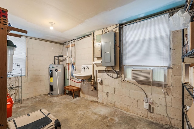 utilities with electric panel, water heater, sink, and cooling unit