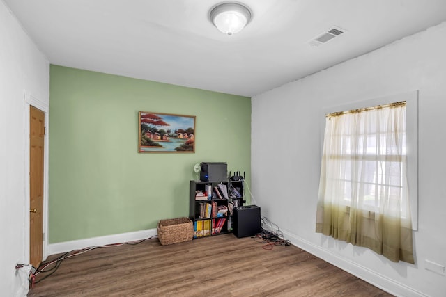 interior space with hardwood / wood-style floors