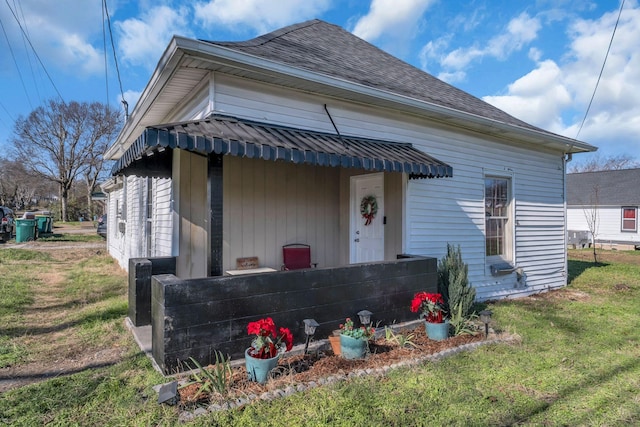 bungalow with a front lawn