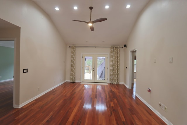 unfurnished room with ceiling fan, french doors, high vaulted ceiling, and dark wood-type flooring