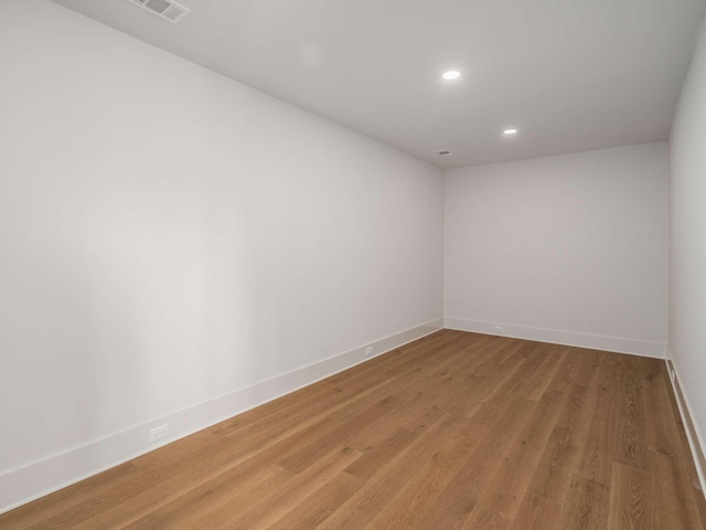 empty room featuring hardwood / wood-style floors