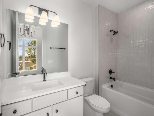 full bathroom with vanity, a chandelier, shower / bathtub combination, and toilet