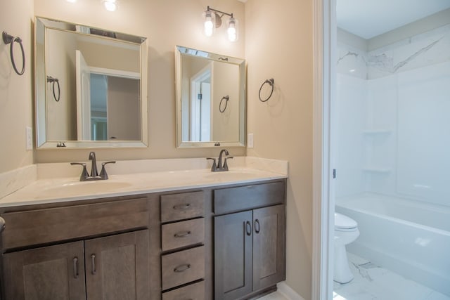 full bathroom with shower / bathing tub combination, vanity, and toilet