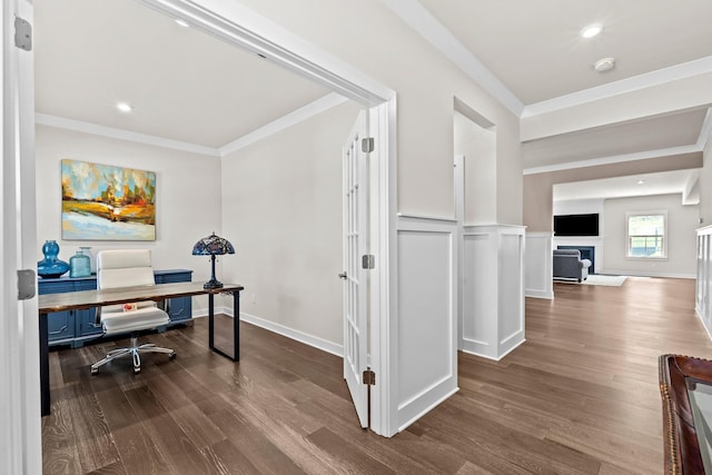 office area featuring ornamental molding and dark wood-type flooring