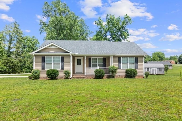 ranch-style house with a porch and a front yard