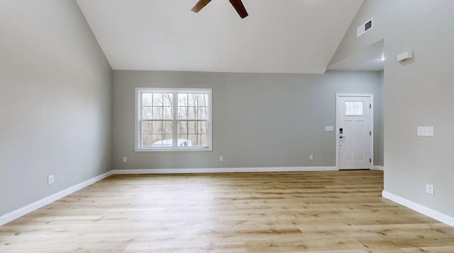 interior space featuring ceiling fan, high vaulted ceiling, and light hardwood / wood-style floors