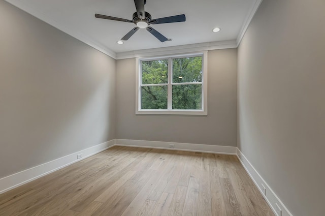 unfurnished room featuring ceiling fan, ornamental molding, and light hardwood / wood-style flooring