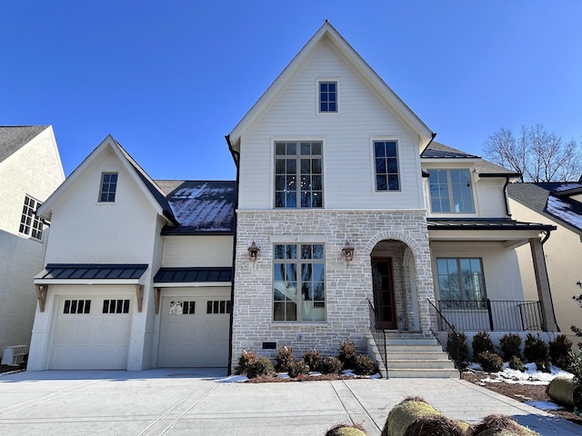 view of front of property featuring a garage