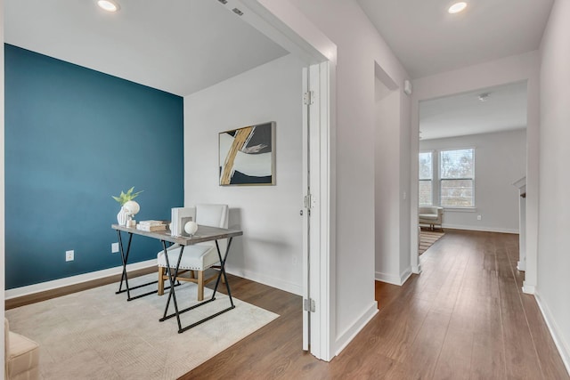 office space with hardwood / wood-style flooring