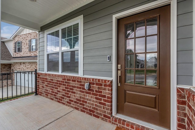 entrance to property with covered porch