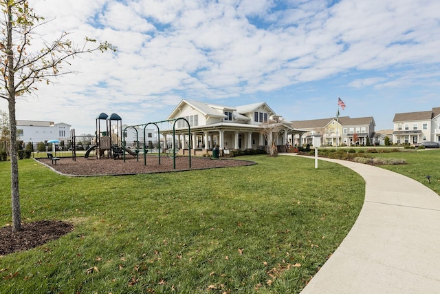 view of playground with a yard